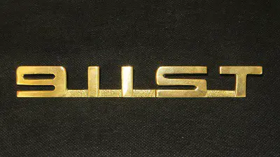 '911St' Gold Engine Lid Script 1