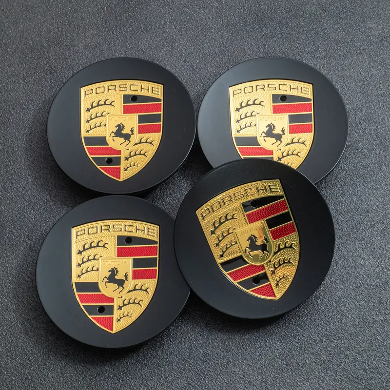 (New) 718 Cayman Gt4/Spyder Black Colored Crest Hubcap Set 2