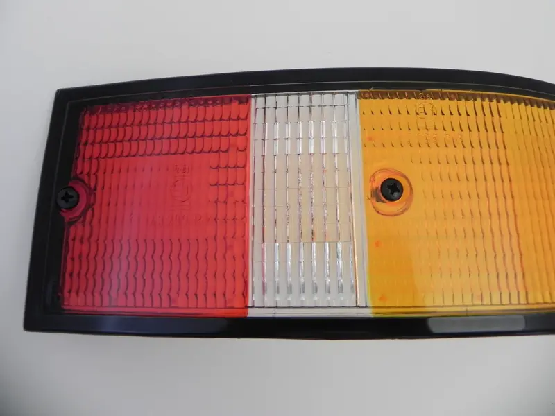 (New) 911/912/930 Genuine Right Side Euro Amber/Red/Clear Tail Light Lens With Black Trim - 1973-89 2