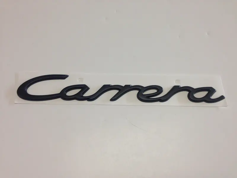 (New) 911 Black "Carrera" Rear Engine Lid Emblem - 1994-98 1
