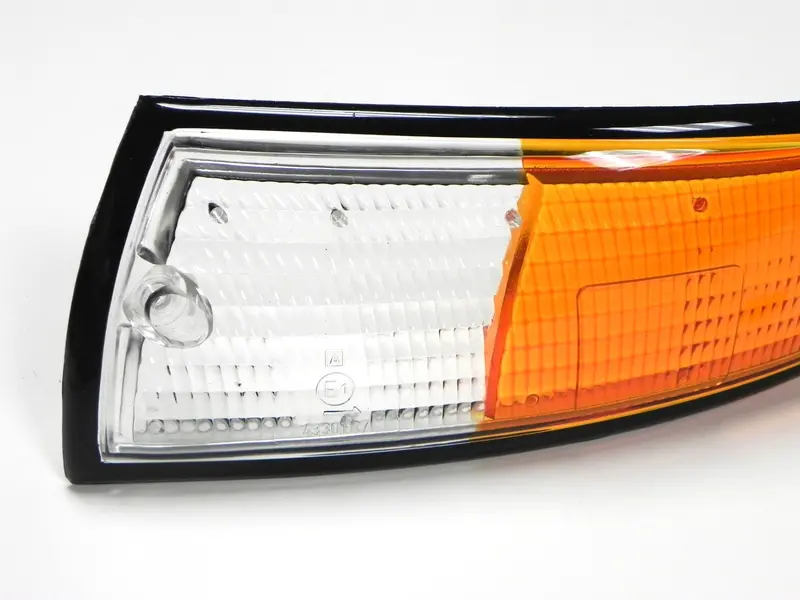 (New) 911 Black Trim Euro Front Left Amber/Clear Turn Signal Lens - 1973 2