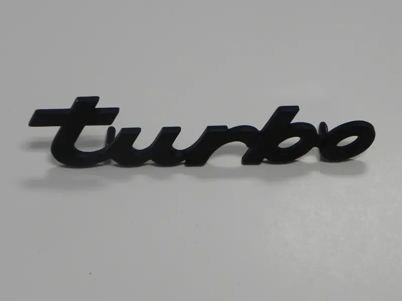 (New) Black Script Emblem: "Turbo" - 1976-77 1