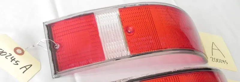 (Original) 911/912E/930 Bosch Usa Rear Left Taillight Lens W/ Black Trim - 1973-89 2