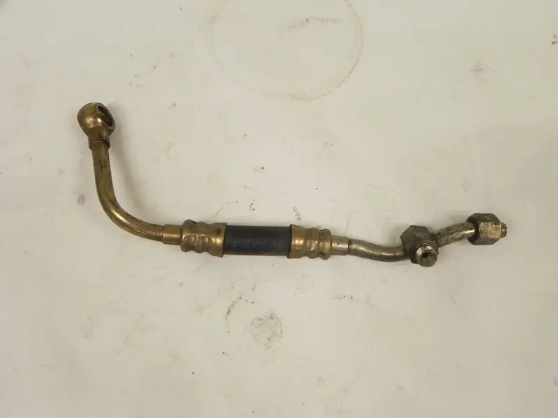 (Used) 911 Oil Pipe Line To Right Hand Chain Housing - 1983-89 1