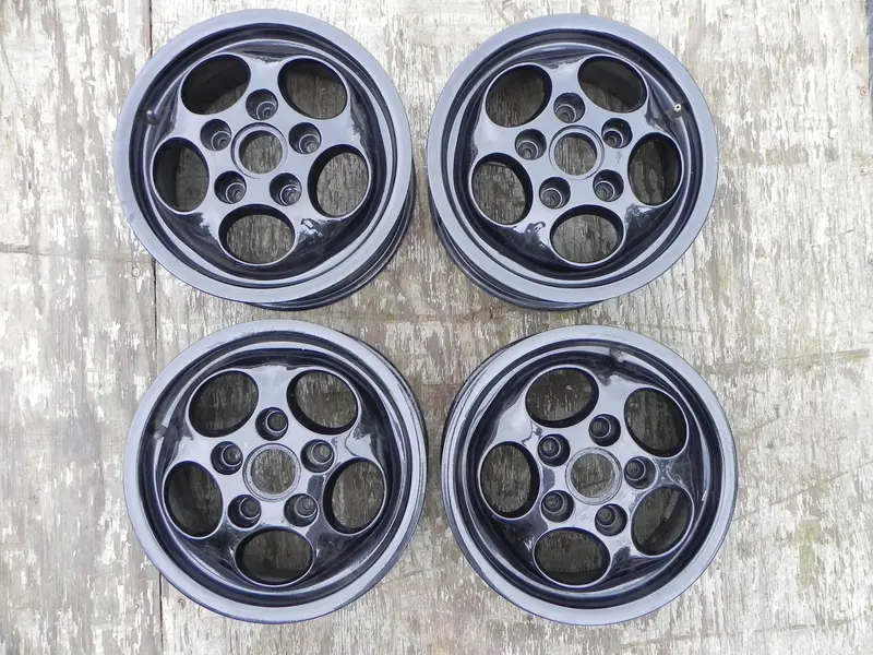 (Used) 944 Set Of 4 Phone Dial 6Jx15" Black Wheels 1