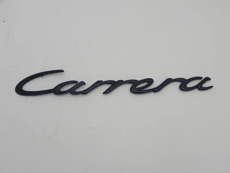 (Used) Original 996 Blue Metallic "Carrera" Engine Lid Emblem - 1999-2004 1